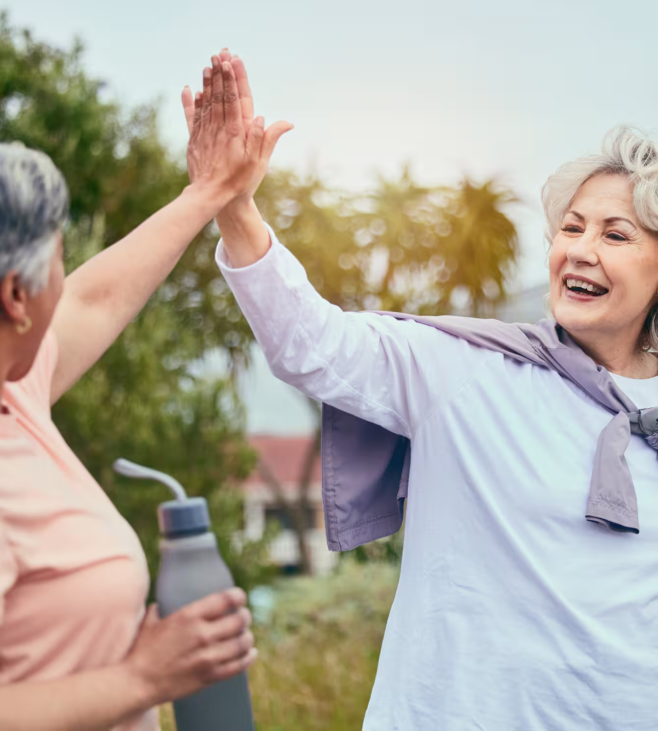 Caregiver talking with resident in comfortable environment