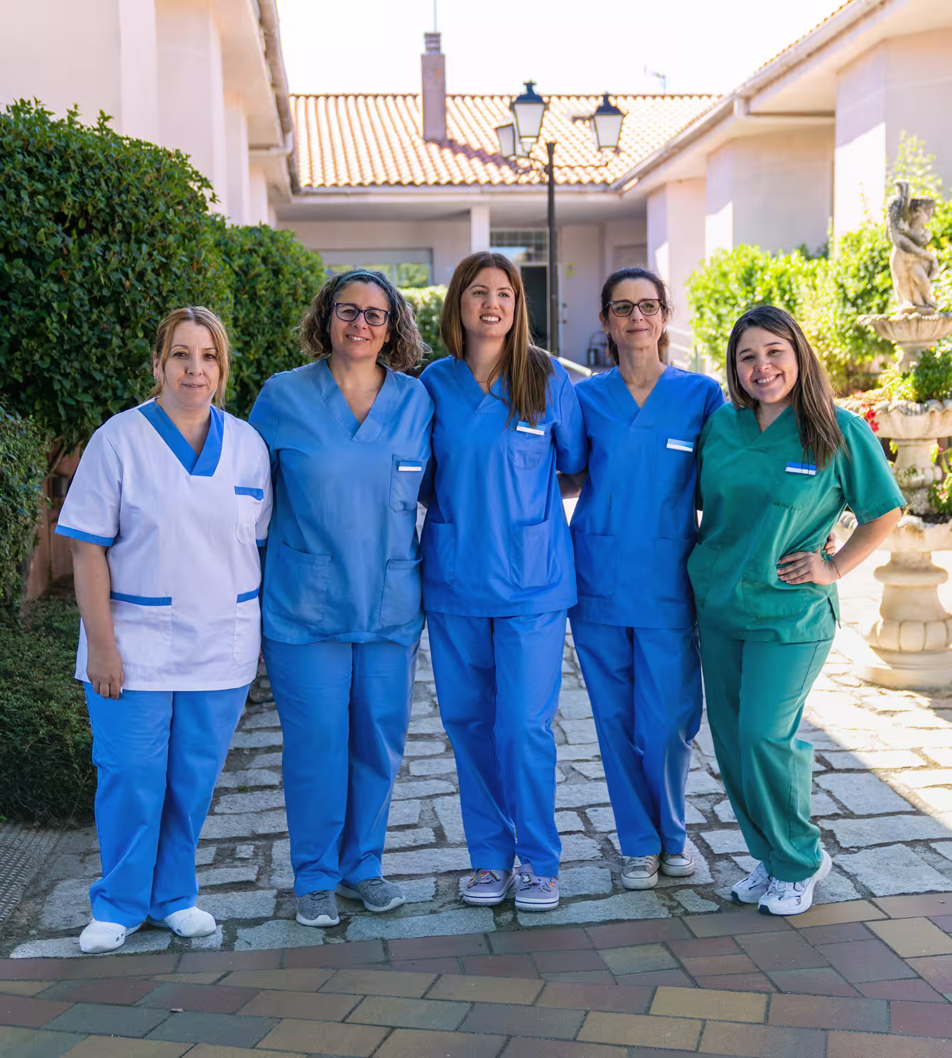 Professional care team member smiling at the residence